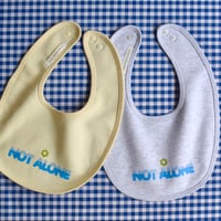 NOT ALONE baby bib