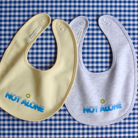 NOT ALONE baby bib