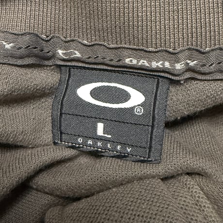 【USED】00's OAKLEY METAL PARTS POLO SHIRT