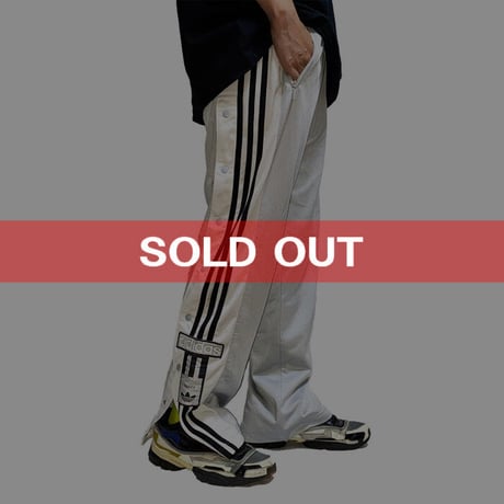 【USED】90'S ADIDAS SIDE SEAM SLITS WITH SNAP BUTTON TRACK PANTS SILVER