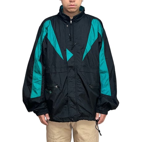 【USED】90's UMBRO 4-POCKET NYLON TRACK JACKET