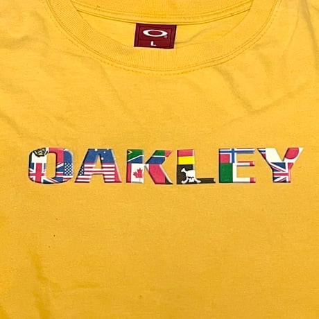 【USED】00's OAKLEY NATIONAL FLAG DESIGN T-SHIRT