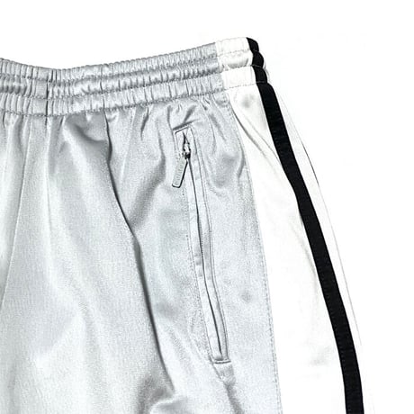 【USED】90'S ADIDAS SIDE SEAM SLITS WITH SNAP BUTTON TRACK PANTS SILVER