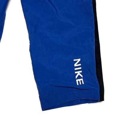 【USED】90's NIKE SIDE SNAP BUTTON TRAINING PANTS