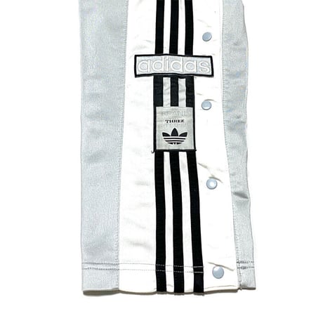【USED】90'S ADIDAS SIDE SEAM SLITS WITH SNAP BUTTON TRACK PANTS SILVER