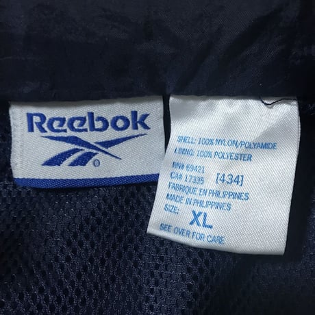 【USED】90'S REEBOK NYLON JACKET EMBROIDERY ON THE SLEEVE