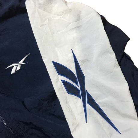 【USED】90'S REEBOK NYLON JACKET EMBROIDERY ON THE SLEEVE