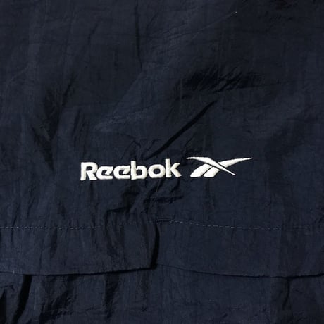 【USED】90'S REEBOK NYLON JACKET EMBROIDERY ON THE SLEEVE
