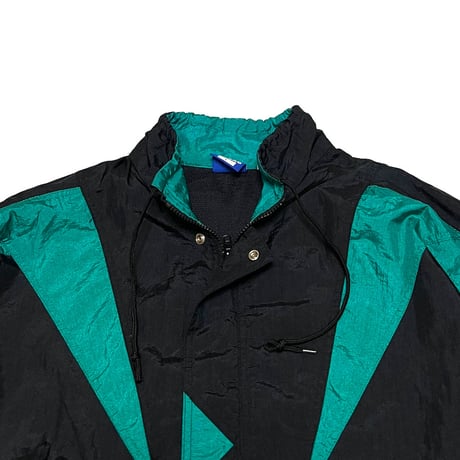 【USED】90's UMBRO 4-POCKET NYLON TRACK JACKET
