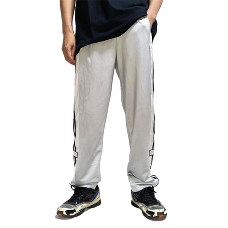 【USED】90'S ADIDAS SIDE SEAM SLITS WITH SNAP BUTTON TRACK PANTS SILVER