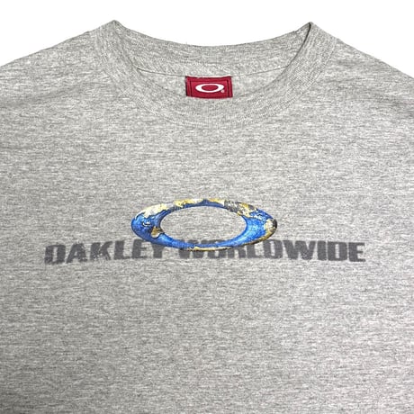 【USED】00's OAKLEY "WORLDWIDE" Ellipse Globe Graphic L/S T-Shirt