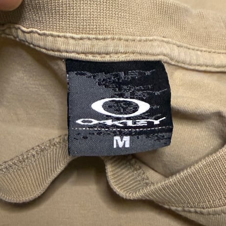 【USED】00's OAKLEY Over-Seam Glitch Graphic T-Shirt Sand Beige