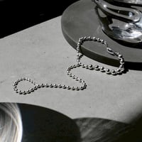 Pome ballchain finger bracelet