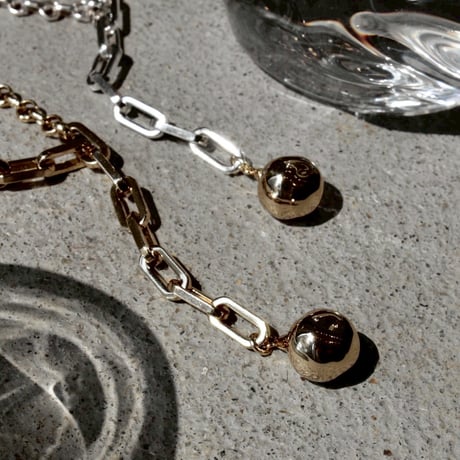 Pome motif necklace