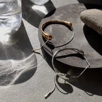 Metal art snake bangle