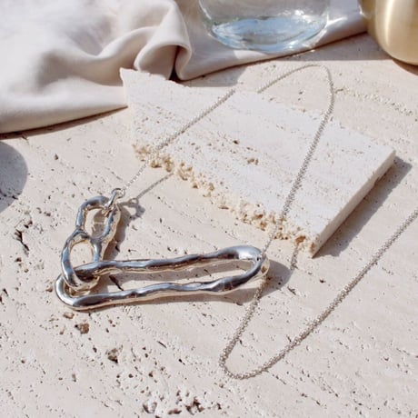 Bit motif necklace