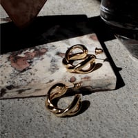 Infinity hoop pierce
