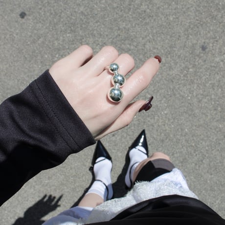 Pome motif ring