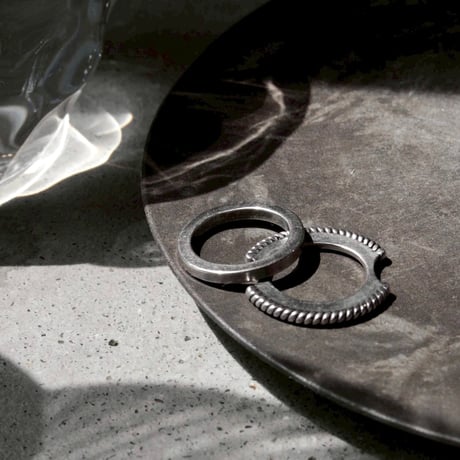 Twist hoop ring