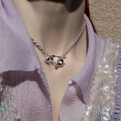 Metal art mantel necklace