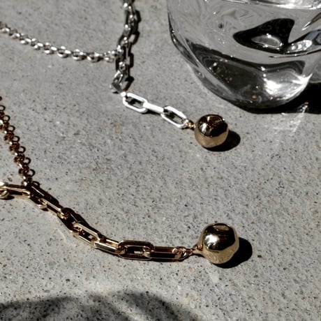 Pome motif necklace