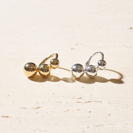 Pome motif ring