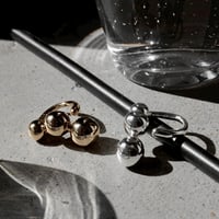 Pome motif ring