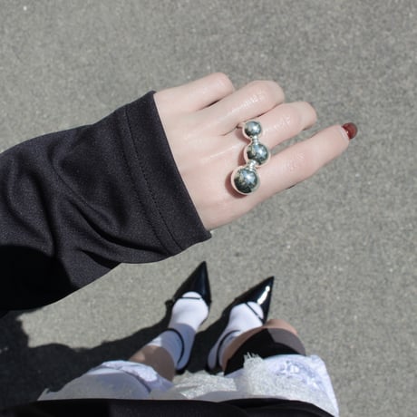 Pome motif ring