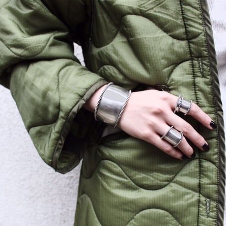 Twist hoop ring