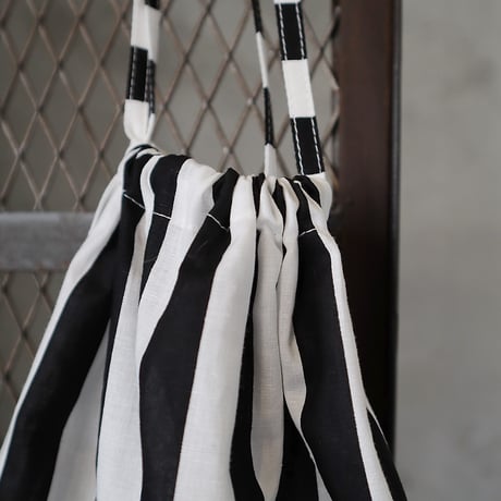 R&D.M.Co- deck-chair stripe drawstring bag(black)