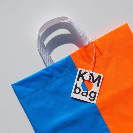 KM bag I/S Fluo Orange /Sky Blue