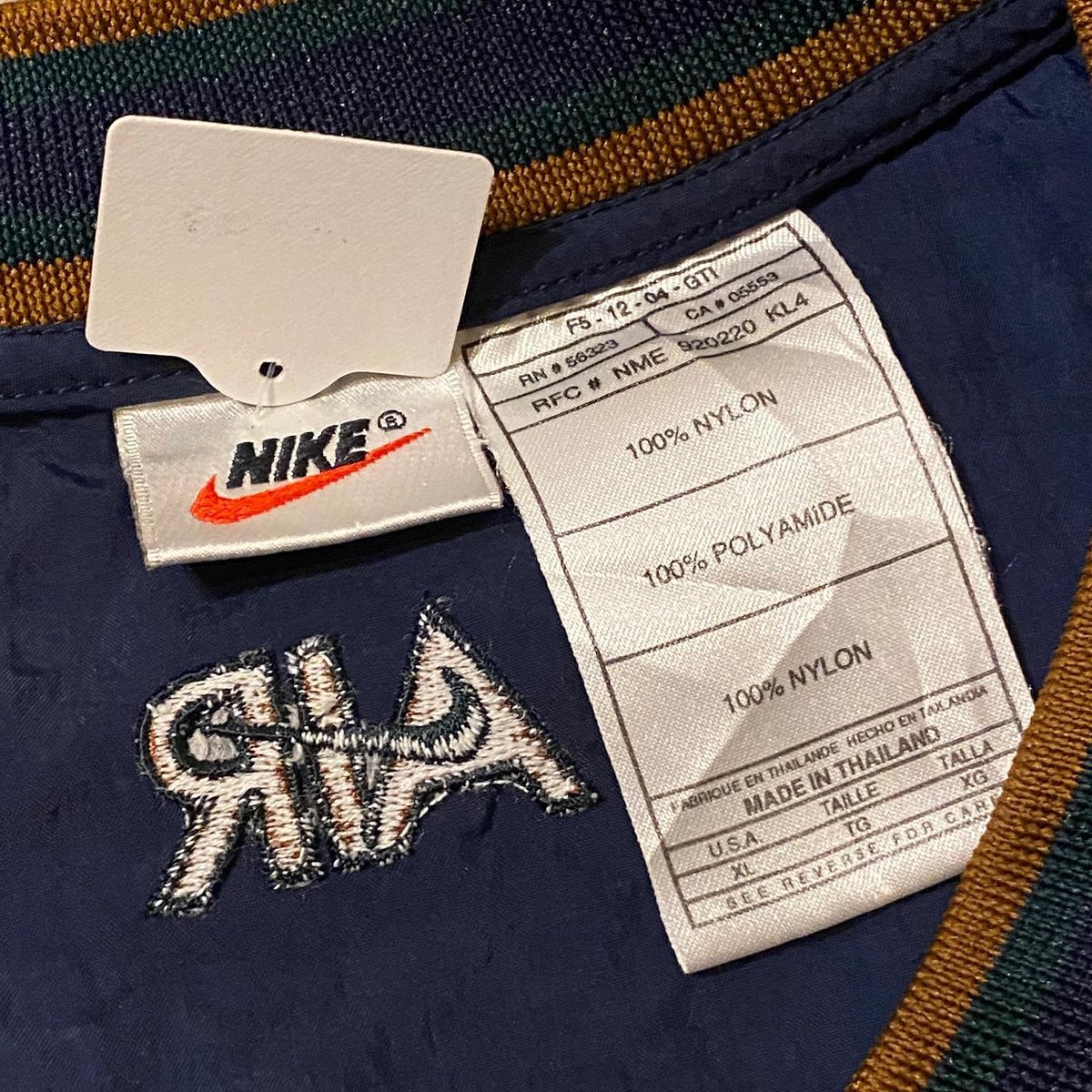 NIKE Vネックナイロンプルオーバー | CUSTOM FEVER