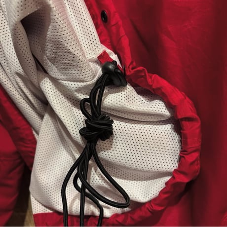 adidas ハーフジップナイロンプルオーバー