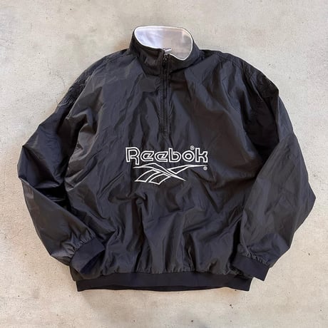 ReebokハーフジップナイロンPO