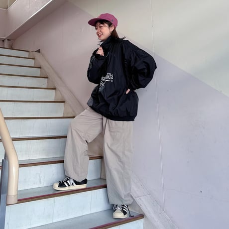 ReebokハーフジップナイロンPO