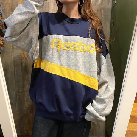 Reebok アシンメトリー切り替えスウェット