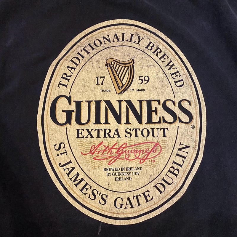 ギネス　ビール　Guinness　Tシャツ　メンズM　アイルランド・ダブリン 古着GUINNESSギネスビールTシャツアイルランド袖ラインオーバー