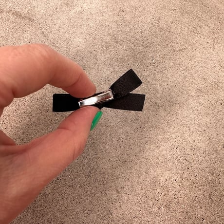Tiny black ribbon clip