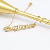 sign necklace