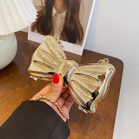 Tiny metal bow bag