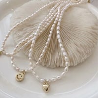 Freshwater pearl necklace w tiny top