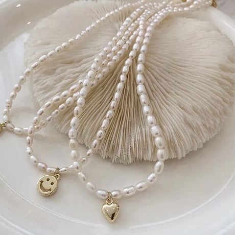 Freshwater pearl necklace w tiny top