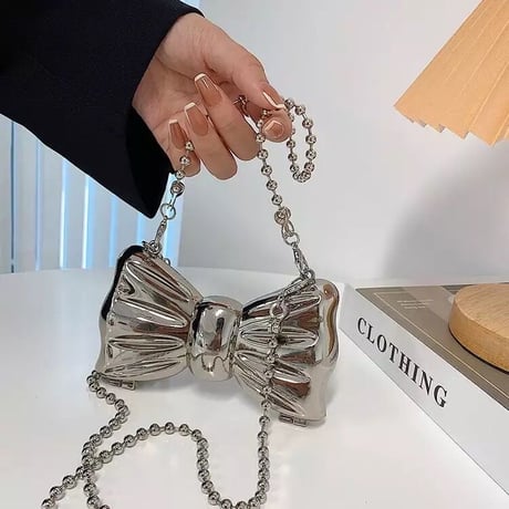 Tiny metal bow bag