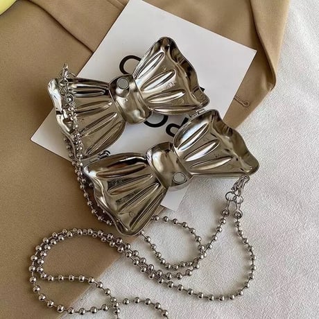 Tiny metal bow bag