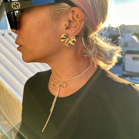 Her ribbon earrings