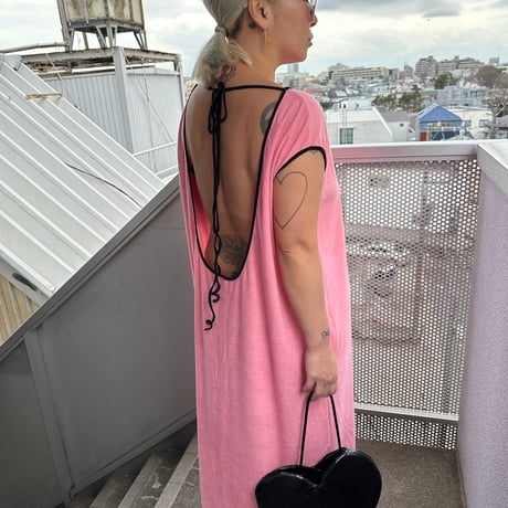 Deep back open pile dress