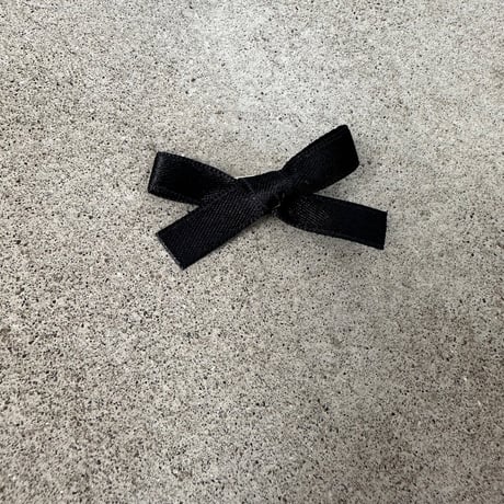 Tiny black ribbon clip