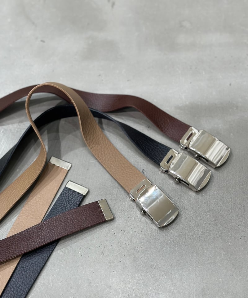 roller buckle belt | Un sourire.