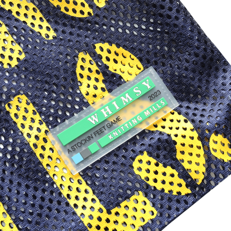 WHIMSY MESH KANPSACK - NAVY | BOTTOM LINE