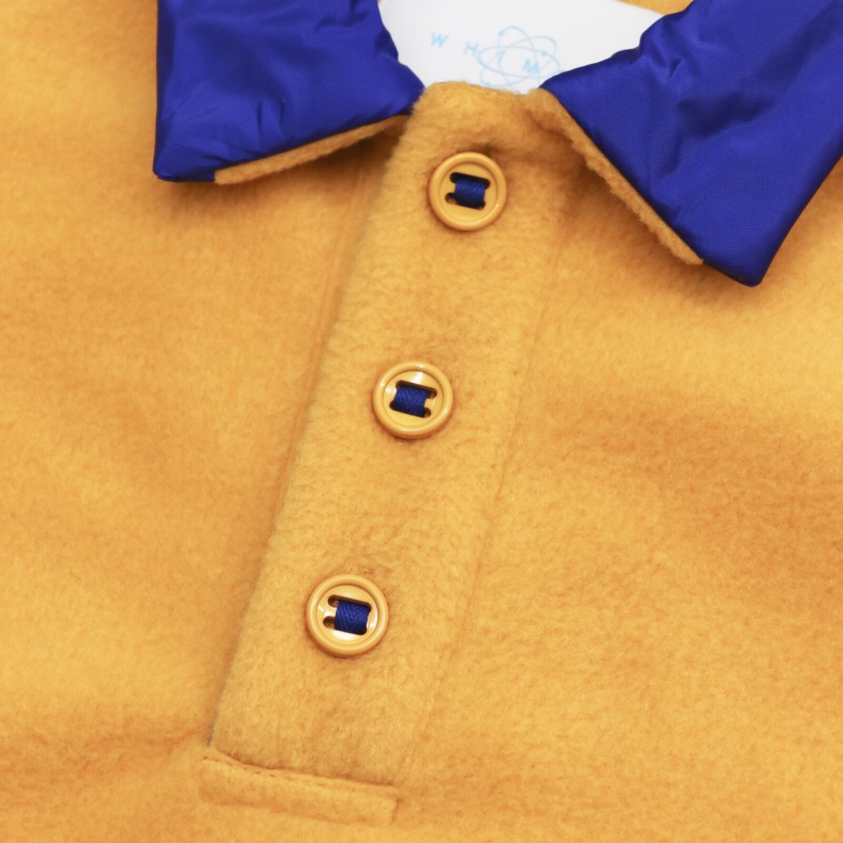 WHIMSY FLEECE RAGLAN POLO - MANGO | BOTTOM LINE